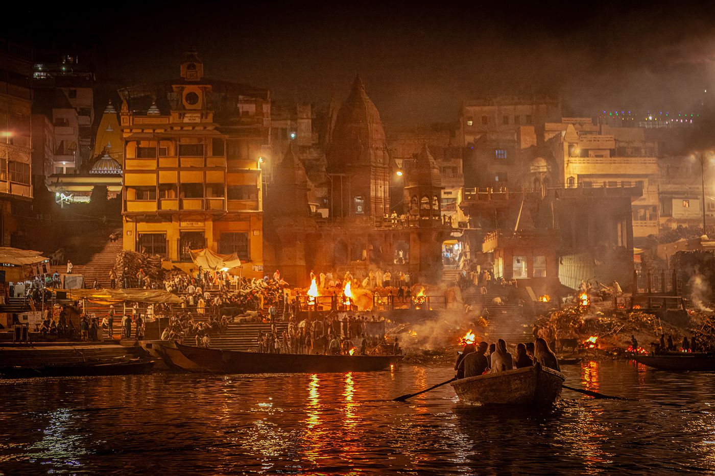 Rowing into the Burning Ghat, Varanasi, India by Richard Murrin